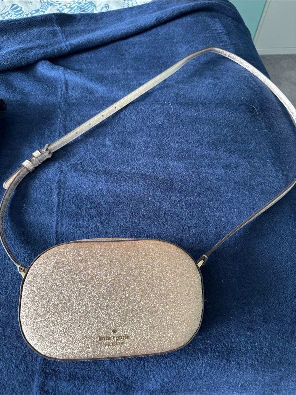 kate spade Glitter Rose Gold Oval Crossbody Bag